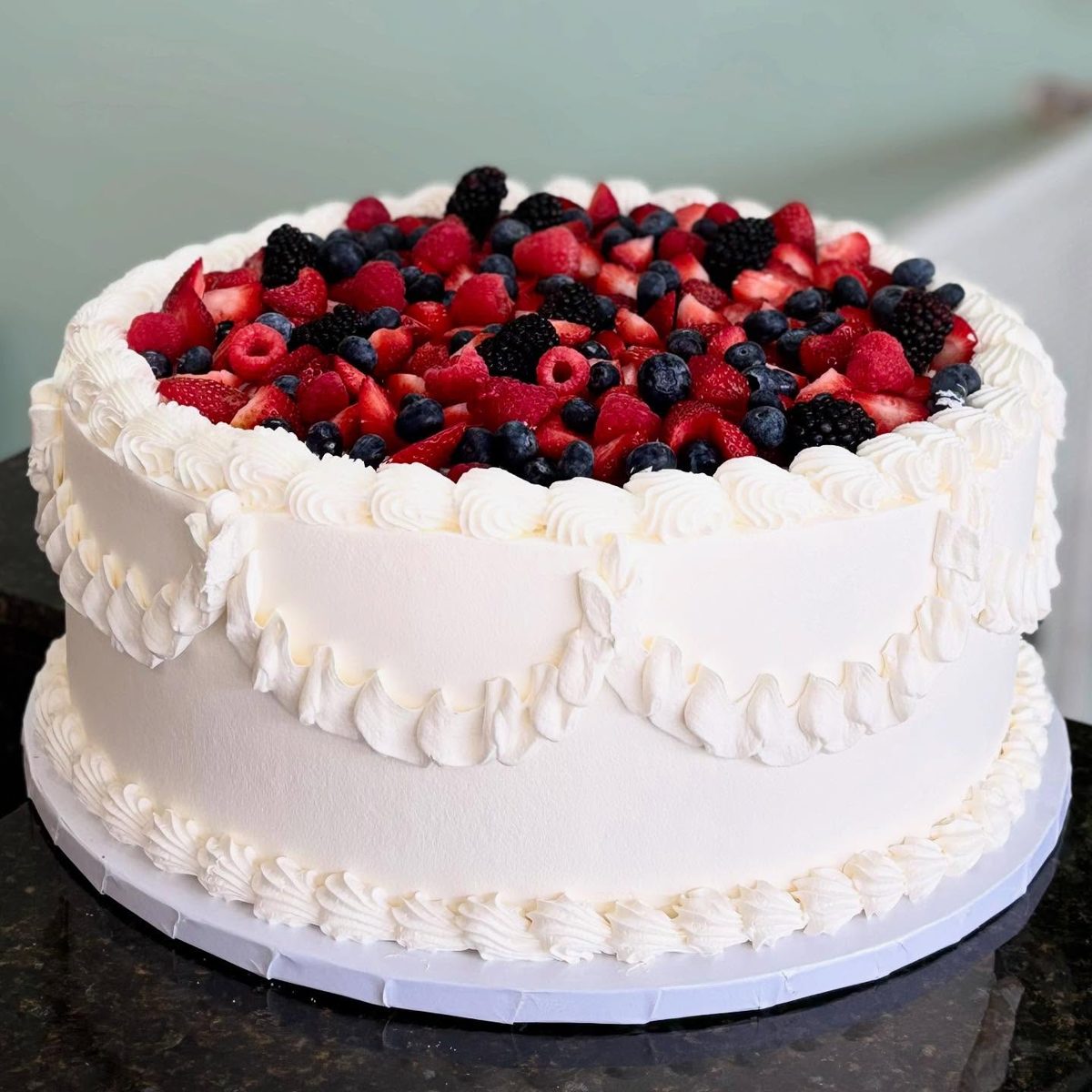 Mixed Berry Cake With Piped Swags from Tarzana Bakery