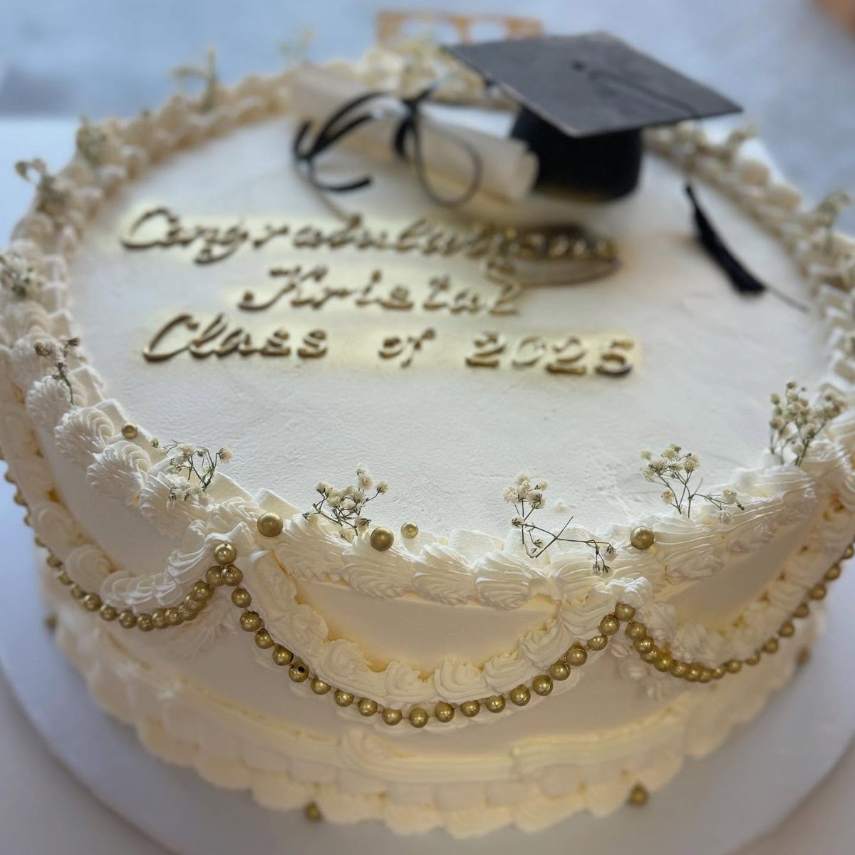 White Graduation Cake With Gold Swags from Tarzana Bakery