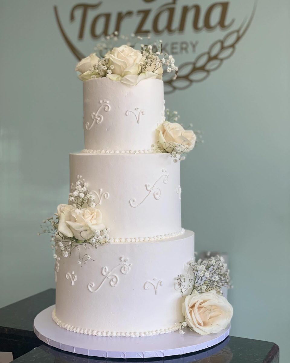 Three-Tier White Rose and Scrollwork Cake from Tarzana Bakery