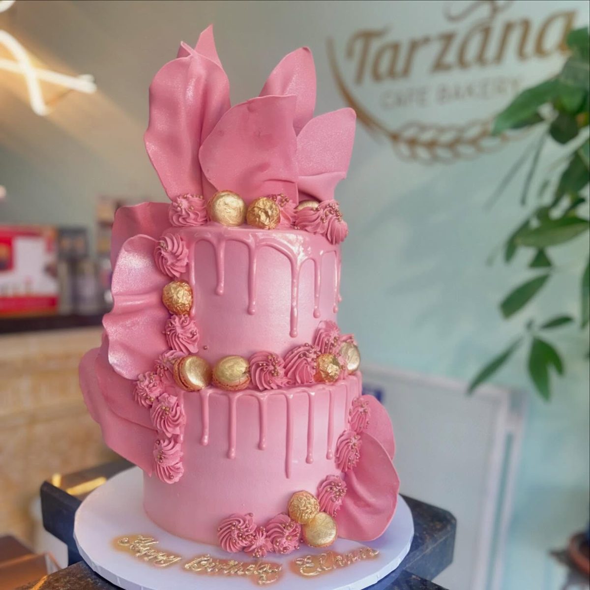Pink Tiered Drip Cake with Gold Accents from Tarzana Bakery