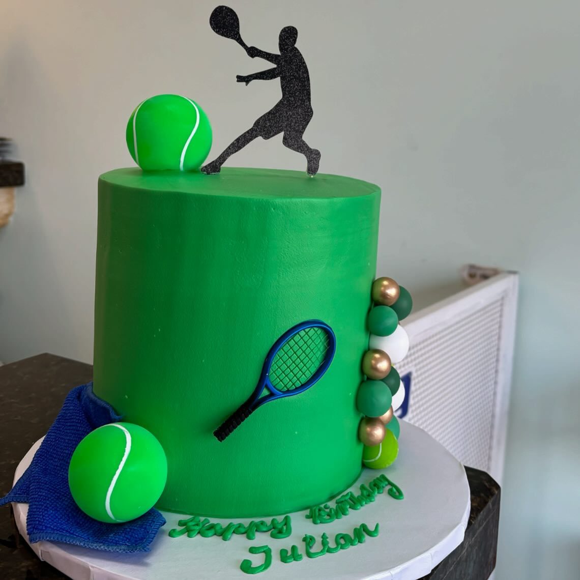 Green Tennis Cake With Player Silhouette from Tarzana Bakery
